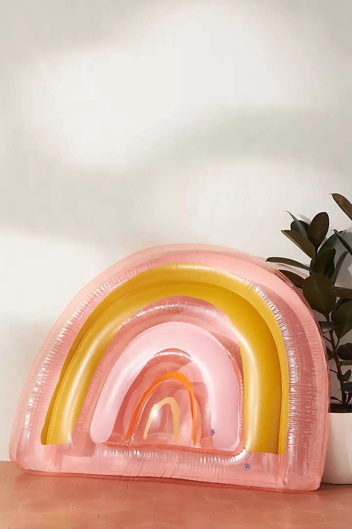 Sunnylife Rainbow Pool Float. Image via Anthropologie.