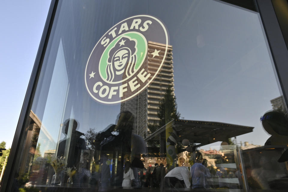 A logo of a newly opened Stars Coffee coffee shop in the former location of the Starbucks coffee shop in Moscow, Russia, Thursday, Aug. 18, 2022. A new chain of coffee shops opens Thursday in Moscow, after Russian singer and entrepreneur Timur Yunusov, better known as Timati, together with Russian restaurateur Anton Pinskiy bought the Starbucks stores following company's withdrawal from Russia. (AP Photo/Dmitry Serebryakov)