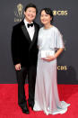 <p>Actor Ken Jeong and wife Tran cleaned up well for the red carpet, with Ken looking dapper in a velvet tux and Tran shimmering in silver. </p>