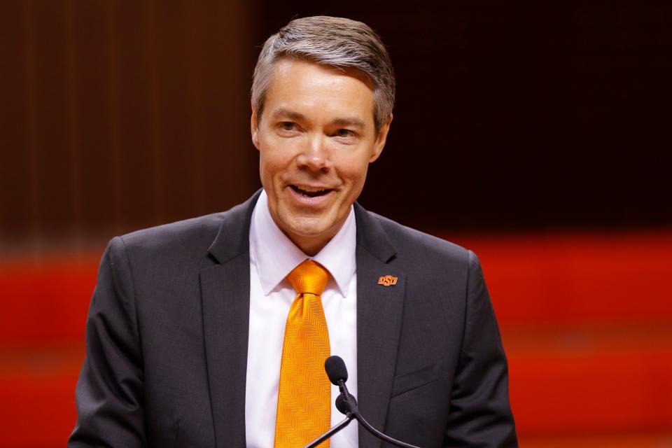 Oklahoma State athletic director Chad Weiberg introduces Jacie Hoyt as the school's new head women's basketball coach at Gallagher-Iba Arena on March 21, 2022.