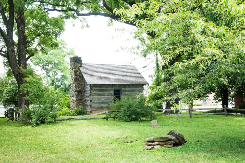 Old log schoolhouse cabin in historic Bardstown, KY, USA