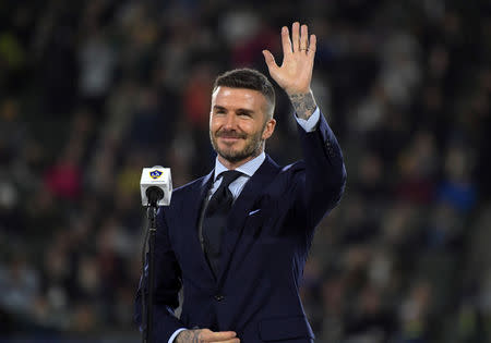 FILE PHOTO: Mar 2, 2019; Carson, CA, USA; David Beckham acknowleges the crowd during LA Galaxy ring of honor ceremony at Dignity Health Sports Park. Mandatory Credit: Kirby Lee-USA TODAY Sports/File Photo