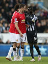Football - Newcastle United v Manchester United - Barclays Premier League - St James' Park - 4/3/15 Manchester United's Jonny Evans clashes with Newcastle's Papiss Cisse Action Images via Reuters / Lee Smith Livepic EDITORIAL USE ONLY. No use with unauthorized audio, video, data, fixture lists, club/league logos or "live" services. Online in-match use limited to 45 images, no video emulation. No use in betting, games or single club/league/player publications. Please contact your account representative for further details.