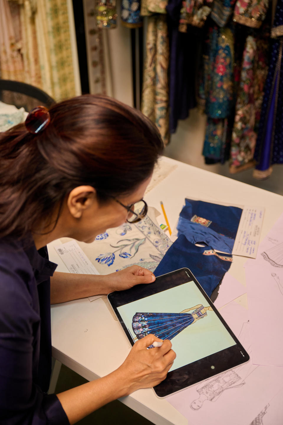 Anita Dongre’s sketching the look for her Diwali Barbie doll.