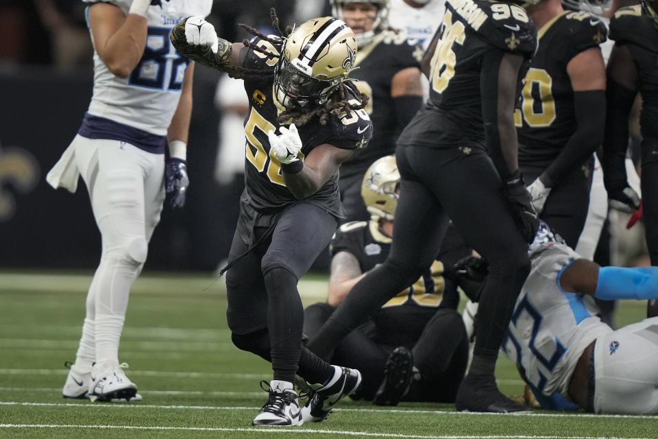 New Orleans Saints linebacker Demario Davis celebrates a defensive stop in the second half of an NFL football game against the Tennessee Titans in New Orleans, Sunday, Sept. 10, 2023. (AP Photo/Gerald Herbert)