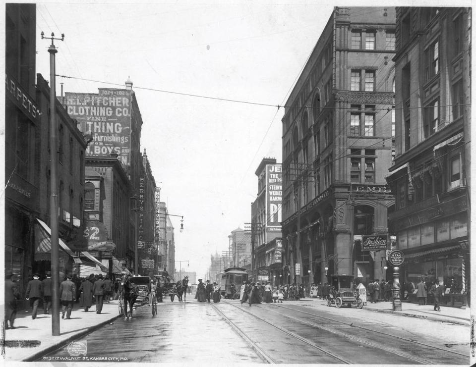 The Emery, Bird, Thayer building is on the right in this 1906 view down Walnut Street.