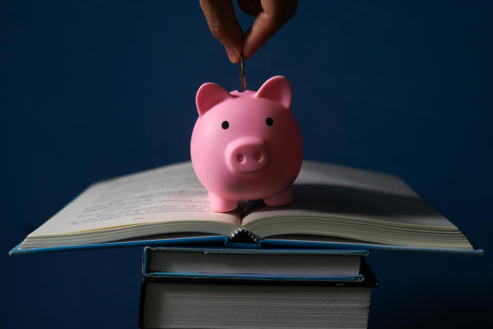 book with piggy bank,Education  Concept,book