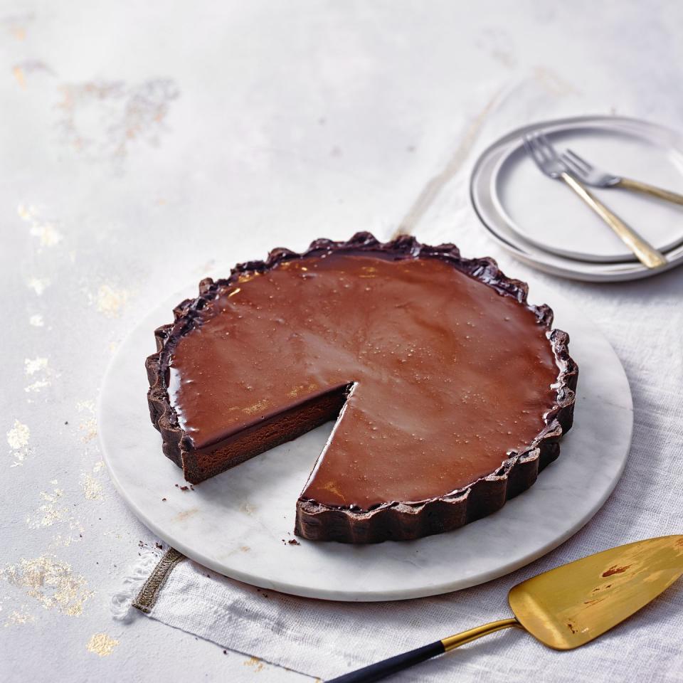 <p>This glazed chocolate tart recipe is as simple as it gets. A decadent dessert.</p><p><strong>Recipe: <a href="https://www.goodhousekeeping.com/uk/food/recipes/a36273825/chocolate-tart/" rel="nofollow noopener" target="_blank" data-ylk="slk:Glazed Chocolate Mousse Tart;elm:context_link;itc:0;sec:content-canvas" class="link ">Glazed Chocolate Mousse Tart</a></strong></p>