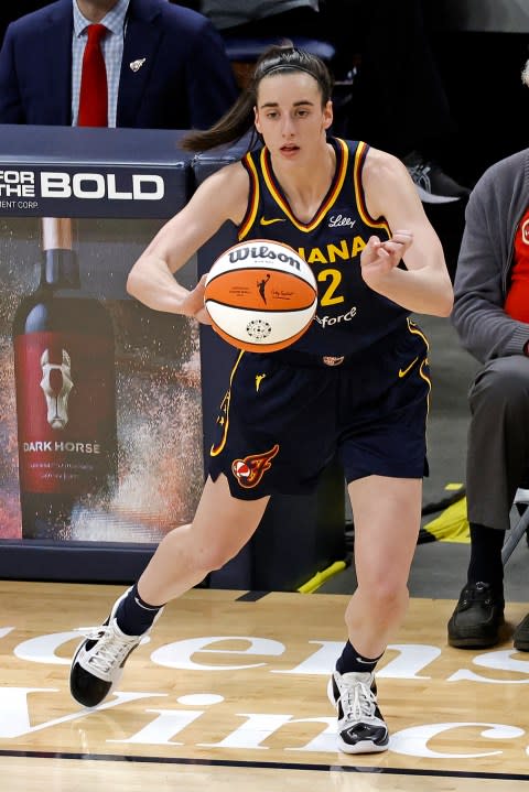 INDIANAPOLIS, IN – MAY 09: Indiana Fever guard Caitlin Clark (22) makes an inbounds pass against the Atlanta Dream during a WNBA preseason game on May 9, 2024, at Gainbridge Fieldhouse in Indianapolis, Indiana. (Photo by Brian Spurlock/Icon Sportswire via Getty Images)