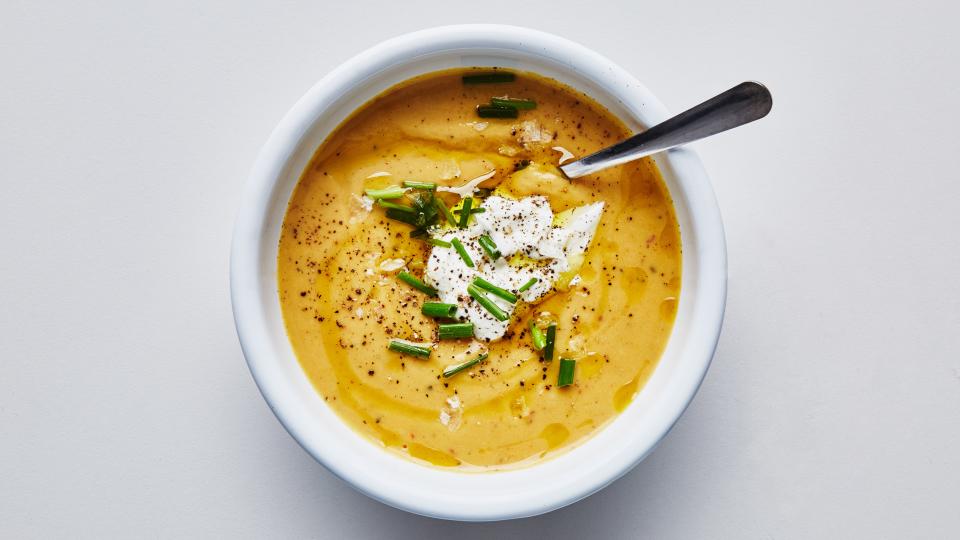 Chives, Greek yogurt, and olive oil top this easy squash soup.