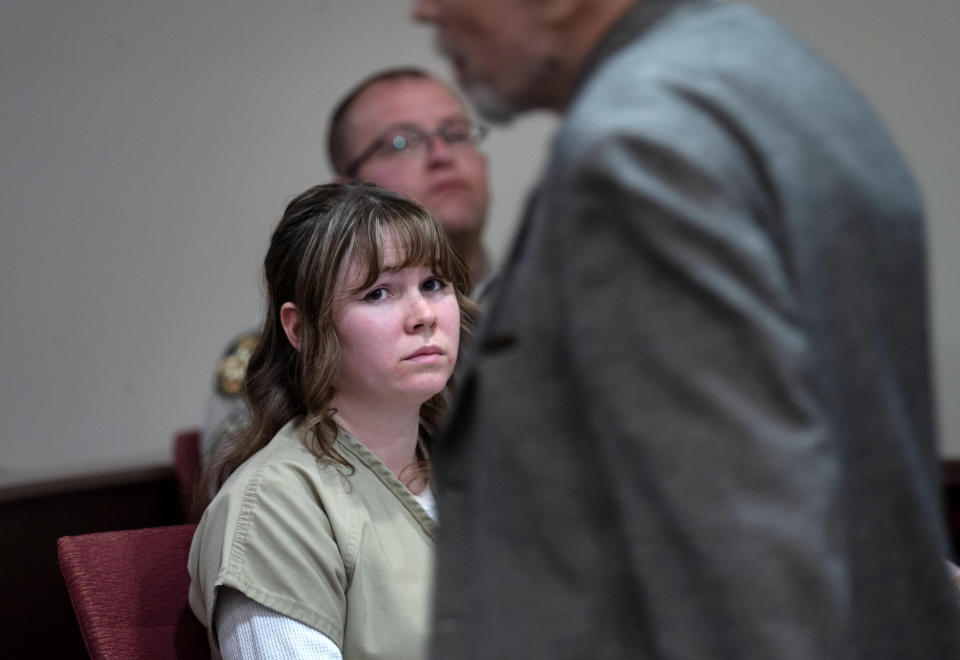 SANTA FE, NEW MEXICO - APRIL 15: Hannah Gutierrez Reed watches her father Thell Reed leave the podium after he asked the judge not impose prison time on his daughter in First District Court, on  April 15, 2024 in Santa Fe, New Mexico. Armorer on the set of the Western film "Rust,"Gutierrez Reed was convicted by a jury of involuntary manslaughter in the death of cinematographer Halyna Hutchins who was fatally shot by Alec Baldwin in 2021. Gutierrez Reed was sentenced to 18 months in prison. (Photo by Eddie Moore-Pool/Getty Images)