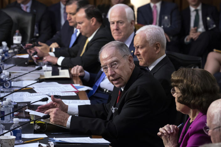 <p>Senate Judiciary Committee Chairman Chuck Grassley, R-Iowa, center, wraps up the first day of confirmation hearings for President Donald Trump’s Supreme Court nominee, Brett Kavanaugh, on Capitol Hill in Washington, Tuesday, Sept. 4, 2018. He is flanked by committee members, from top left, Sen. Ted Cruz, R-Texas, Sen. Mike Lee, R-Utah, Sen. John Cornyn, R-Texas, Sen. Orrin Hatch, R-Utah, and Sen. Dianne Feinstein, D-Calif. (Photo: J. Scott Applewhite/AP) </p>