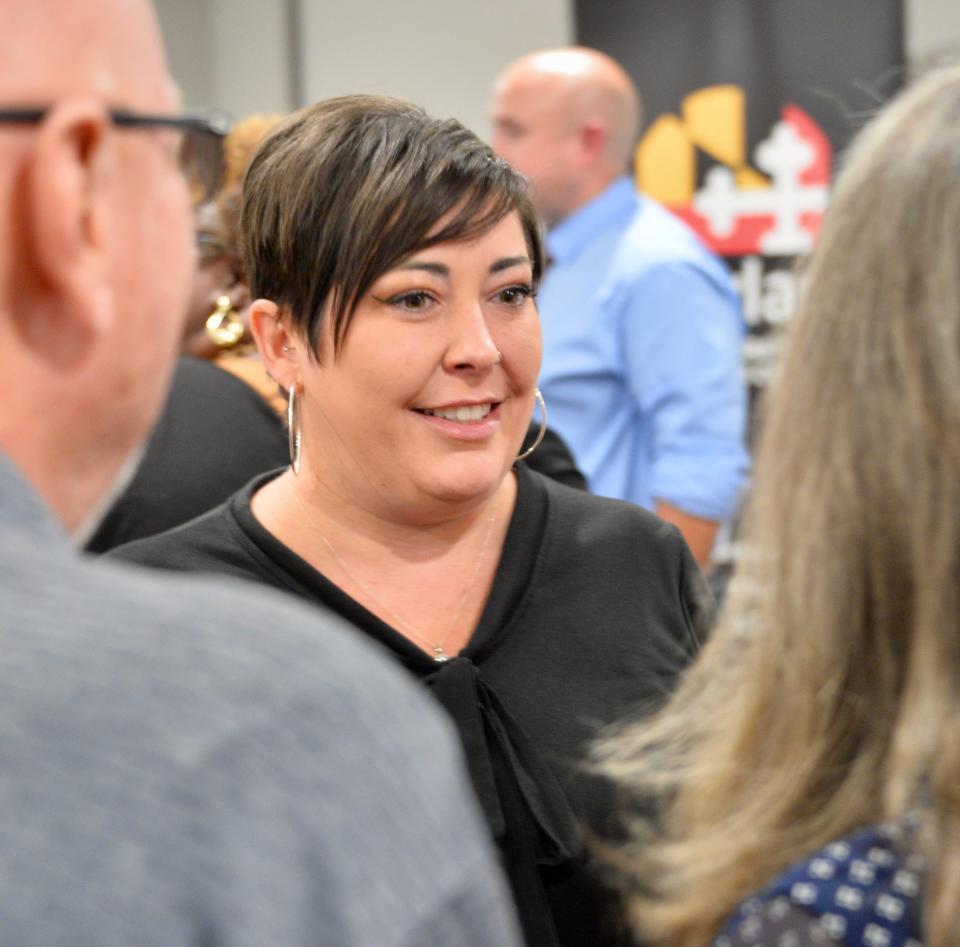 Emily Keller, the state's special secretary of opioid response and a former Hagerstown mayor, chats with some attendees after Wednesday night's Community Overdose Action Town Hall in downtown Hagerstown.