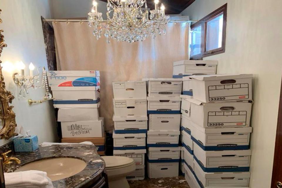 This image, contained in the indictment against former President Donald Trump, shows boxes of records stored in a bathroom and shower in the Lake Room at Trump's Mar-a-Lago estate in Palm Beach, Fla.