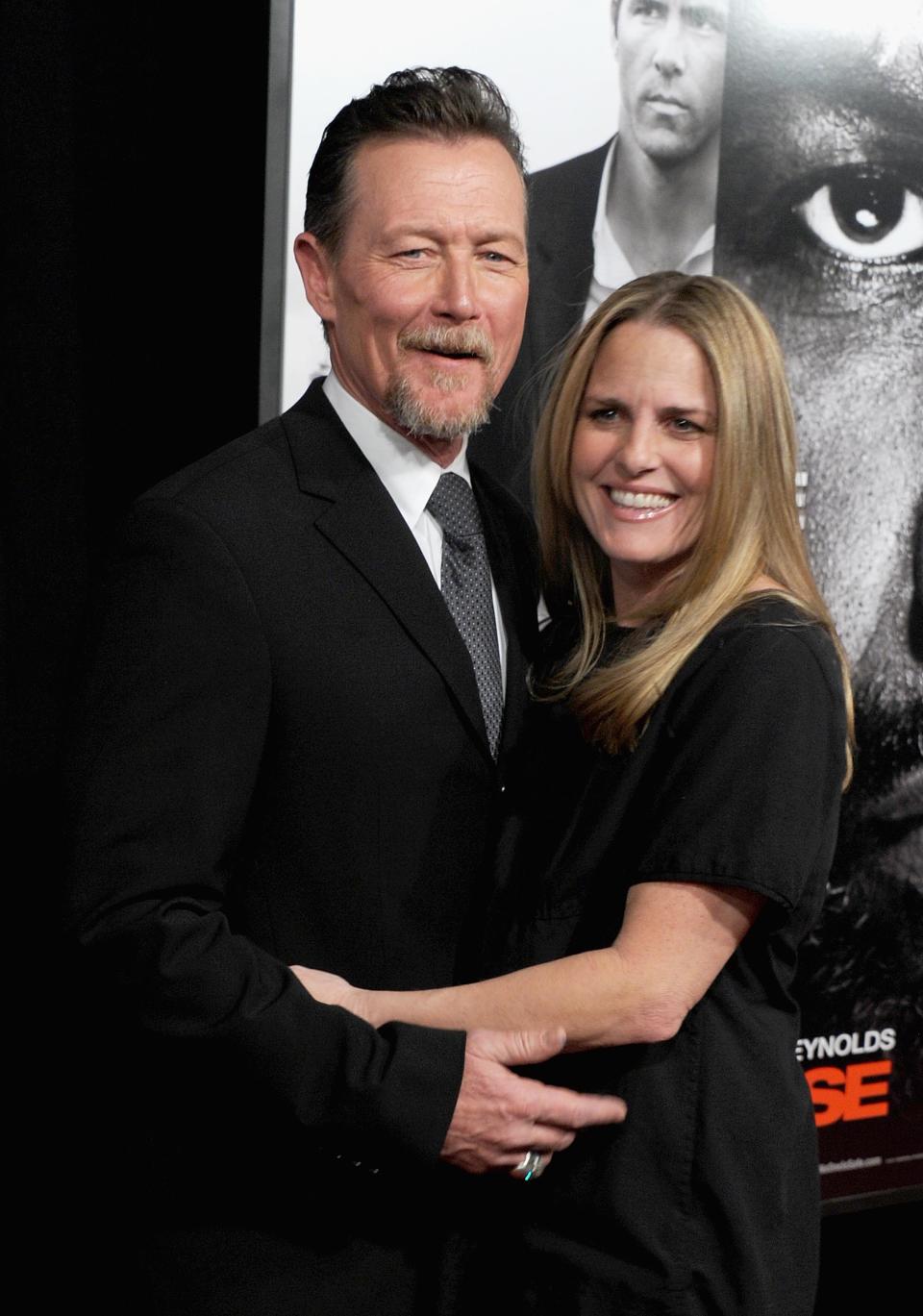 Robert Patrick and guest attend the "Safe House" premiere at the SVA Theater on February 7, 2012 in New York City.