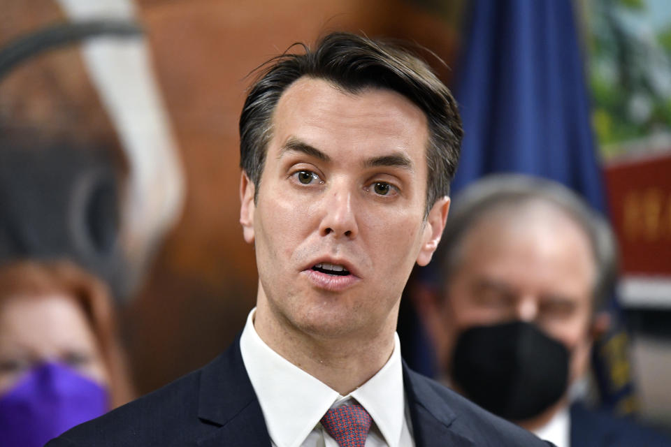 Kentucky Senate Minority Leader Morgan McGarvey addresses the media as he accepts an endorsement from Rep. John Yarmuth, D-Ky., right, for his seat in the House of Representatives in Louisville, Ky., Monday, Feb. 7, 2022. (AP Photo/Timothy D. Easley)