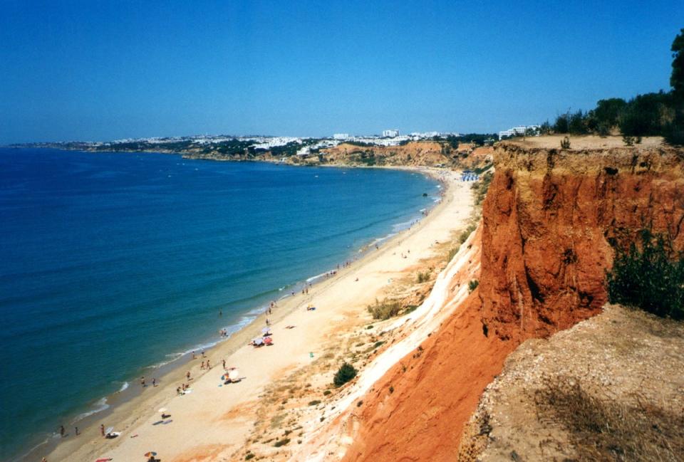 Praia da Falesia is instantly recognisable by its orange cliffs (Getty Images/iStockphoto)