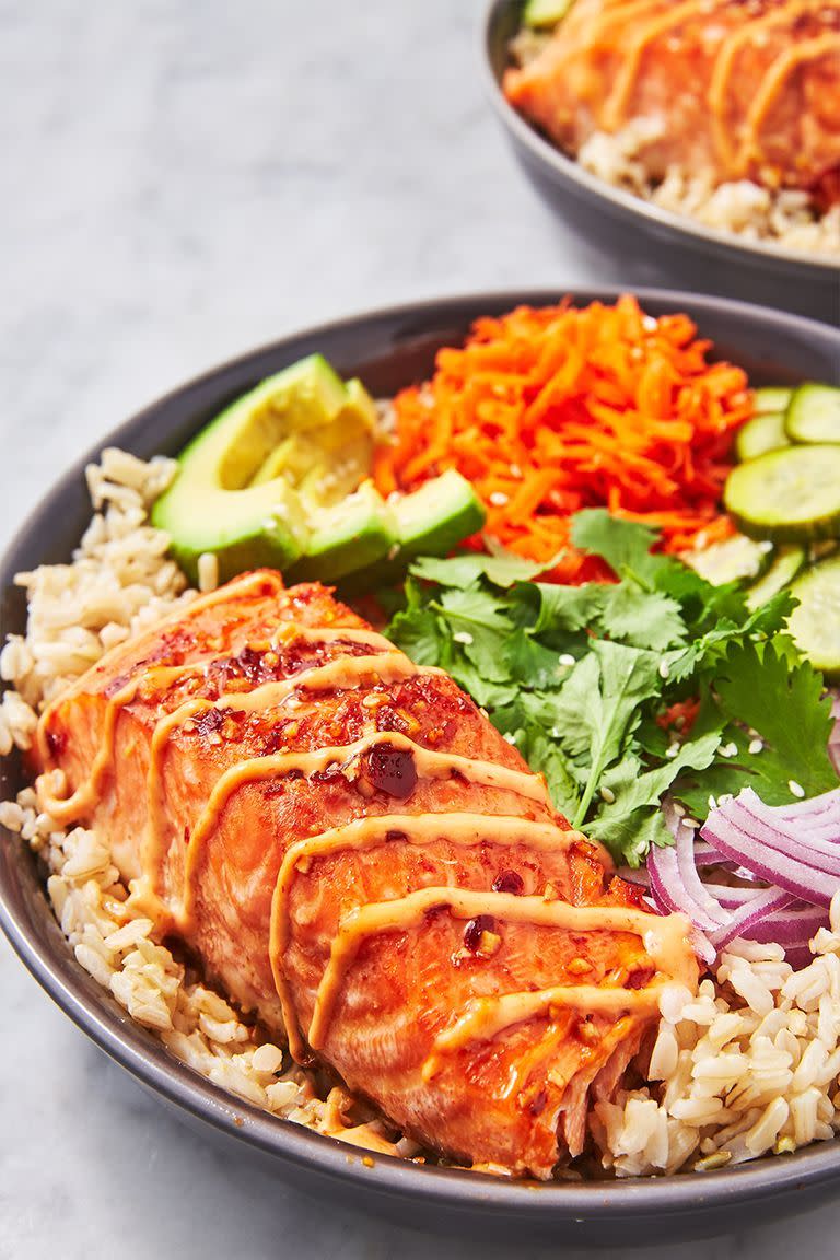 <p>All the healthy components of this grain bowl are great on their own—<a href="https://www.delish.com/cooking/recipe-ideas/recipes/a55315/best-baked-salmon-recipe/" rel="nofollow noopener" target="_blank" data-ylk="slk:baked salmon;elm:context_link;itc:0;sec:content-canvas" class="link ">baked salmon</a>, nutty <a href="https://www.delish.com/cooking/a21531231/how-to-cook-brown-rice/" rel="nofollow noopener" target="_blank" data-ylk="slk:brown rice;elm:context_link;itc:0;sec:content-canvas" class="link ">brown rice</a>, quick pickled <a href="https://www.delish.com/cooking/g1172/cucumber-recipes/" rel="nofollow noopener" target="_blank" data-ylk="slk:cucumbers;elm:context_link;itc:0;sec:content-canvas" class="link ">cucumbers</a>, and <a href="https://www.delish.com/cooking/recipe-ideas/a39531023/spicy-mayo-recipe/" rel="nofollow noopener" target="_blank" data-ylk="slk:spicy mayo;elm:context_link;itc:0;sec:content-canvas" class="link ">spicy mayo</a>—but once they're tossed together, they somehow taste <em>even</em> better.<br><br>Get the <strong><a href="https://www.delish.com/cooking/recipe-ideas/a26950912/spicy-salmon-bowl-recipe/" rel="nofollow noopener" target="_blank" data-ylk="slk:Spicy Salmon Bowl recipe;elm:context_link;itc:0;sec:content-canvas" class="link ">Spicy Salmon Bowl recipe</a>.</strong></p>