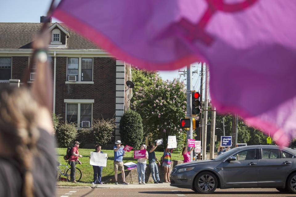 Abortion rights demonstrators protest along Poplar Ave. in Memphis, Tenn. on June 24, 2022 in response to the news of the Supreme Court decision that will overturn the constitutional protections around abortion access. (Andrea Morales for NBC News)