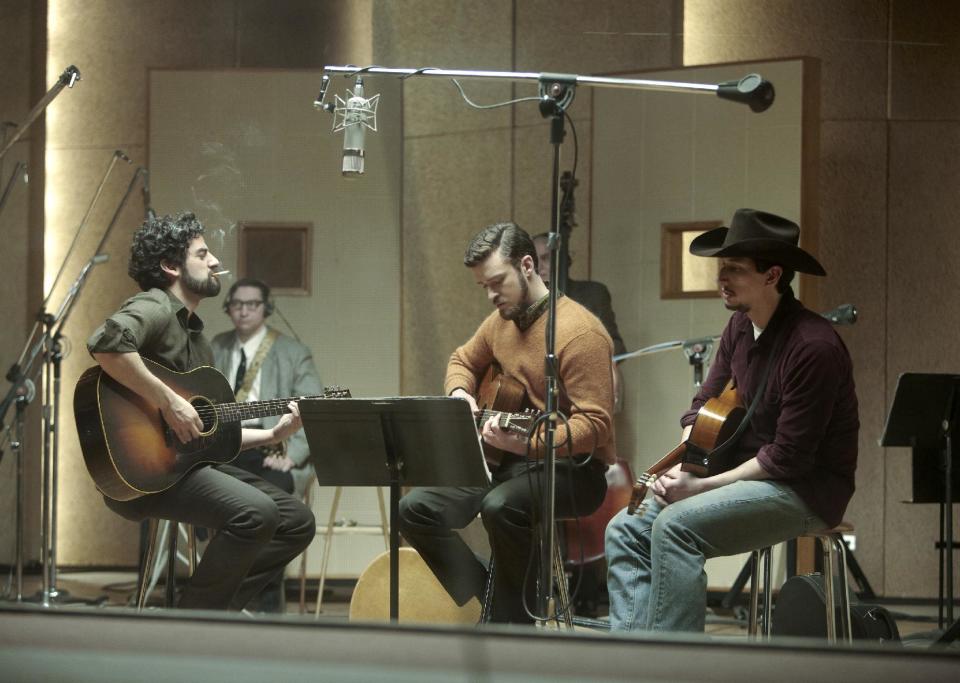 This film image released by CBS FIlms shows, from left, Oscar Isaac, Justin Timberlake and Adam Driver in a scene from "Inside Llewyn Davis." (AP Photo/CBS FIlms, Alison Rosa)