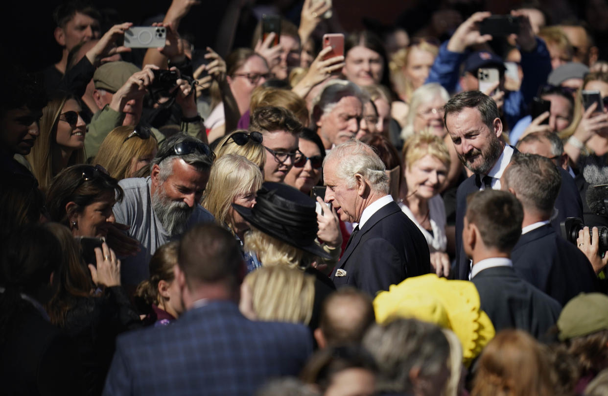 King Charles III (centre) meets members of the public as he leaves the Senedd in Cardiff, Wales, after a visit to receive a Motion of Condolence following the death of Queen Elizabeth II. Picture date: Friday September 16, 2022.