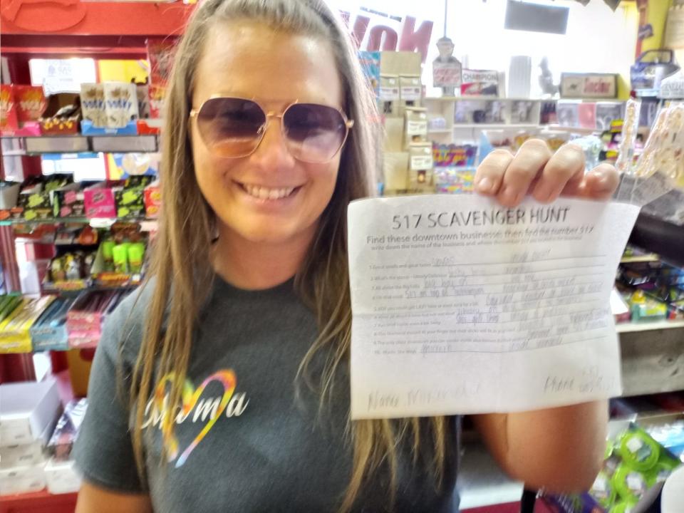 Miranda Harris won the scavenger hunt during the 517 Party on Tuesday at Nova's Soda Pop Candy Shop in Adrian.