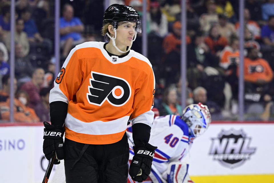 FILE - Philadelphia Flyers' Oskar Lindblom plays during an NHL hockey game against the New York Rangers, Wednesday, April 13, 2022, in Philadelphia. Philadelphia Flyers general manager Chuck Fletcher made what he called “a very difficult decision” in placing forward Oskar Lindblom on waivers on Tuesday, July 2, 2022, for the purpose of buying out the final year of his contract. As part of the decision to free up salary cap space in cutting a player who overcame being diagnosed with Ewing’s sarcoma, the Flyers are donating $100,000 to a Philadelphia organization supporting families impacted by cancer in Lindblom’s name.(AP Photo/Derik Hamilton, File)