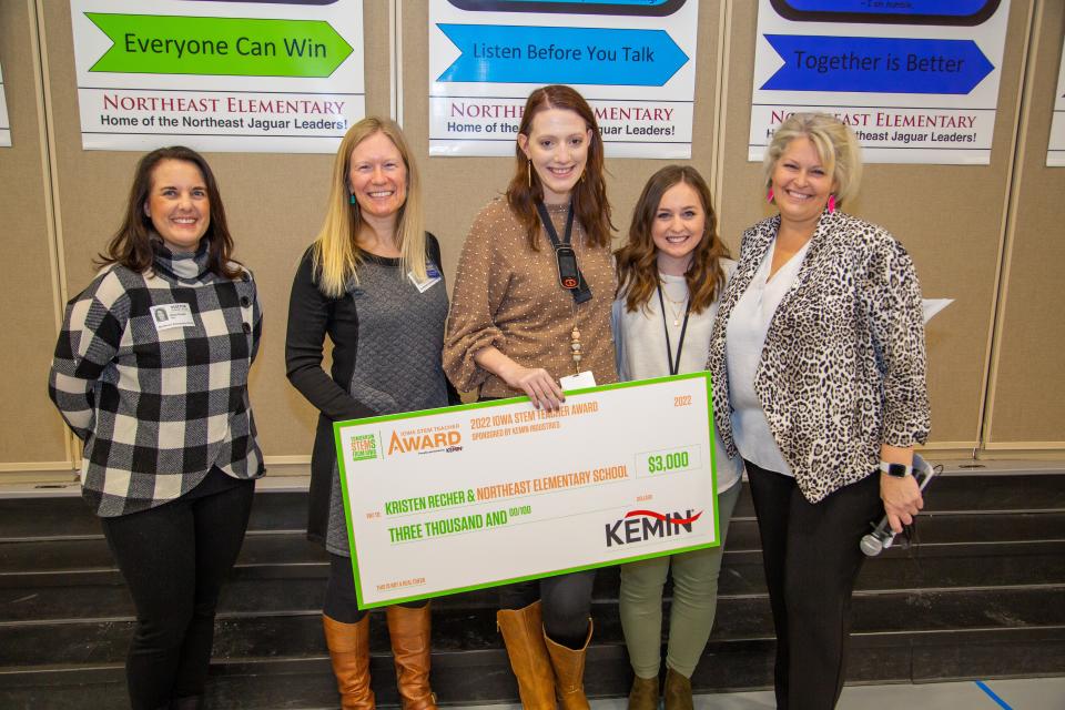 Ankeny teacher Kristen Recher received an award recognizing her commitment to STEM education on Monday. From left to right are: Alice Pareti of Kemin Industries; Sarah Derry, South Central Regional Manager for the STEM Council; Kristen Recher; Kelsey Speer, fellow fifth grade teacher who nominated Recher for the award; and Laura Ryan, Northeast Elementary principal.