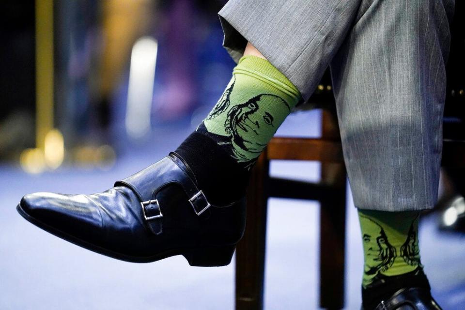 Ketanji Brown Jackson's husband Dr. Patrick Jackson wears green socks with the likeness of Benjamin Franklin