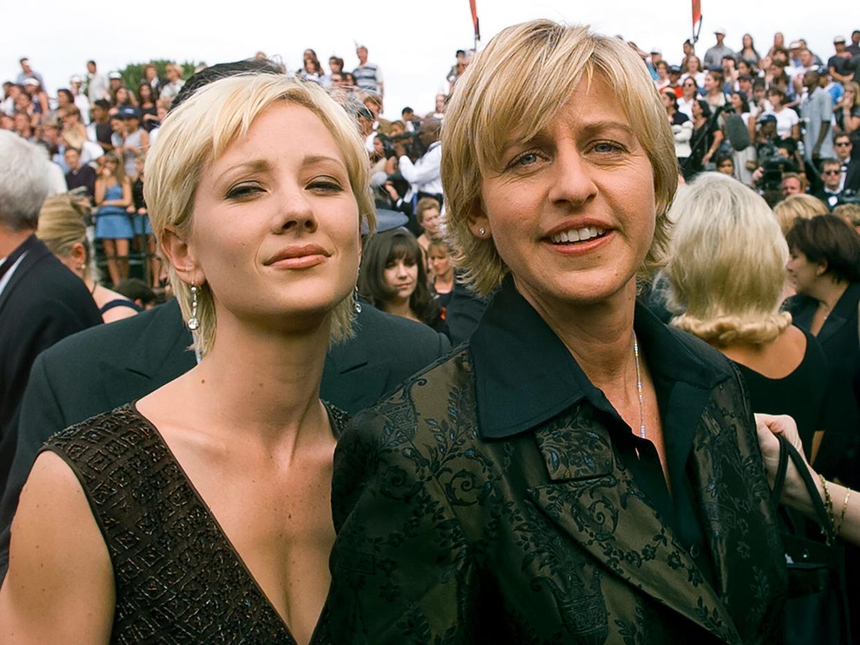 Anne Heche and Ellen DeGeneres pose for a photo.