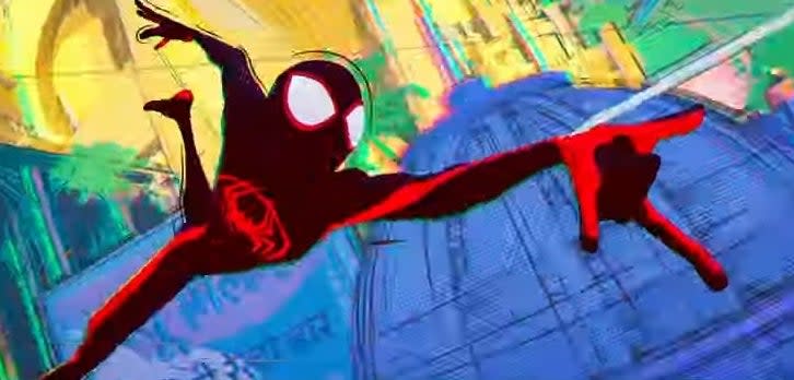 Miles swinging through a city in an alternate dimension in "Spider-Man: Across the Spider Verse (Part One)"