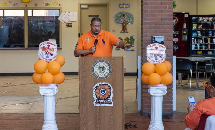 East St. Louis Police Chief Kendall Perry speaks during National Gun Violence Awareness Day at East St. Louis City Hall.  Perry read a new city proclamation during the event, with officials pledging to 