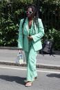 <p>Clara Amfo arrived for Wimbledon's opening day in a mint-green three-piece, with white accessories. </p>