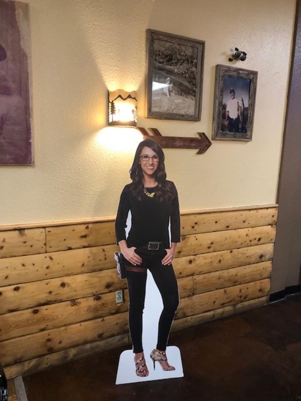 Boebert’s restaurant features cardboard cutouts of the congresswoman and Trump, attracting fans and the simply curious who want to pose for pictures with them (Sheila Flynn)