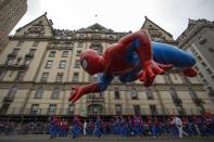 The Spiderman balloon floats down Central Park West during the 88th Macy's Thanksgiving Day Parade in New York November 27, 2014. REUTERS/Eduardo Munoz (UNITED STATES - Tags: SOCIETY TPX IMAGES OF THE DAY)