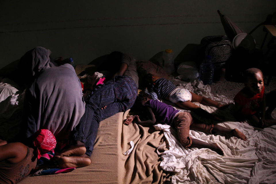 <p>Locals rest inside a shelter before the arrival of the Hurricane Maria in Punta Cana, Dominican Republic, Sept. 20, 2017. (Photo: Ricardo Rojas/Reuters) </p>