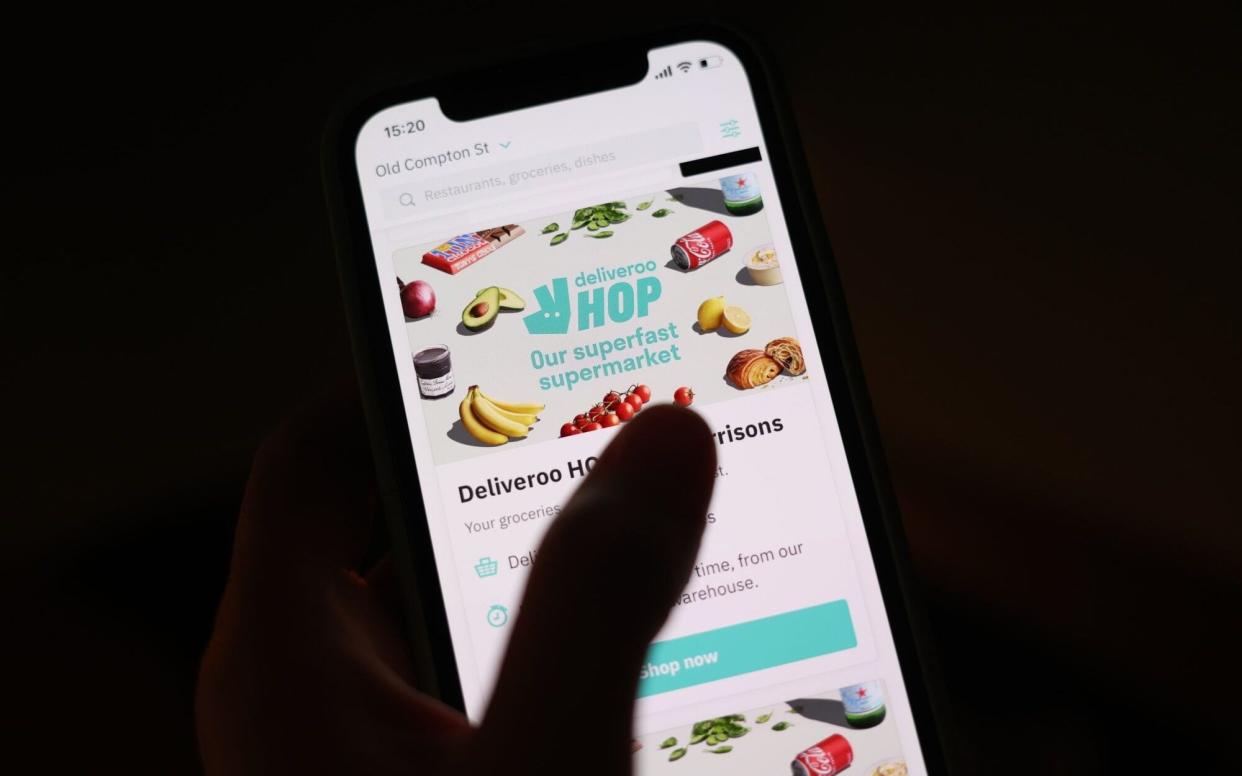 Food delivery options on the Deliveroo Plc app on a mobile phone