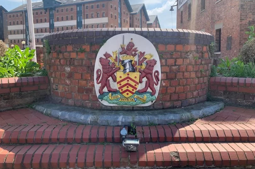 Gloucester City Council crest in North Warehouse car park.