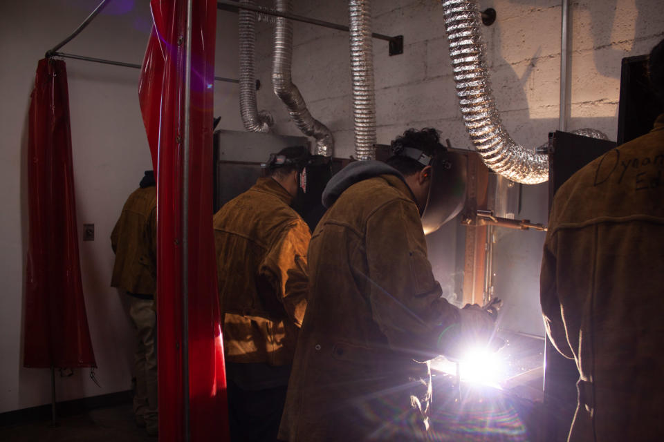 Students practice welding on metal plates as part of the Boys & Girls Club of Los Angeles Harbor’s year-round skilled trades program, taught by Dynamic Education in Los Angeles County. (Enzo Luna/Harbor Freight Tools for Schools)