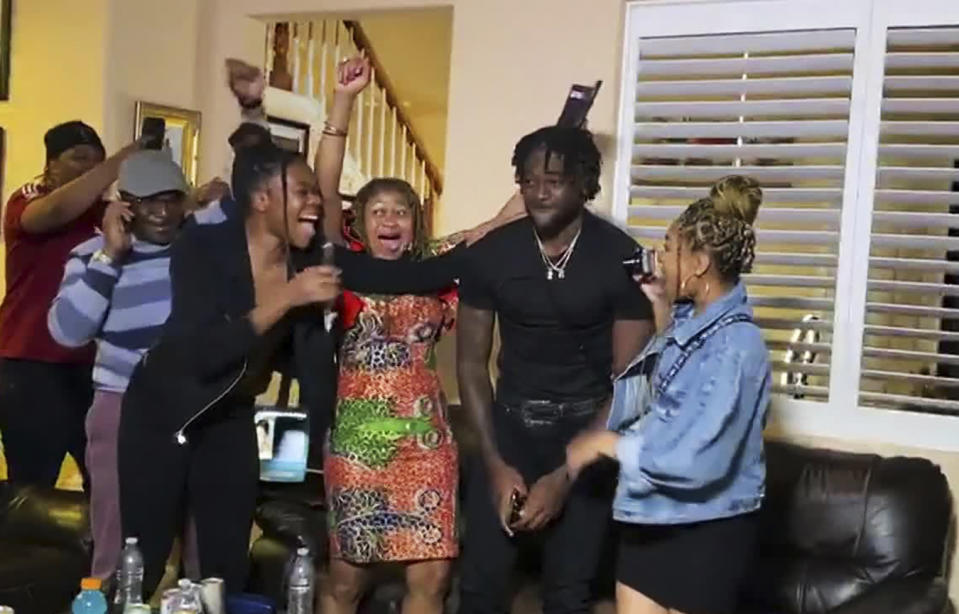 Arizona State wide receiver Brandon Aiyuk, second from right, celebrates after being selected by the San Francisco 49ers in the first round of the 2020 NFL draft on Thursday. (Photo by NFL via Getty Images)