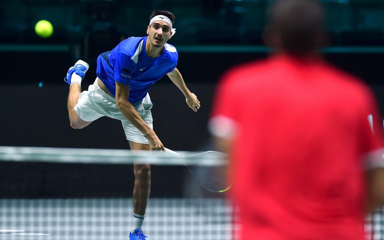 Italy's Lorenzo Sonego in action during his match against Croatia's Borna Gojo - Reuters