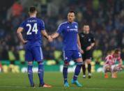 Football - Stoke City v Chelsea - Capital One Cup Fourth Round - Britannia Stadium - 27/10/15 Chelsea's John Terry and Gary Cahill look dejected after losing after a penalty shootout Action Images via Reuters / Alex Morton