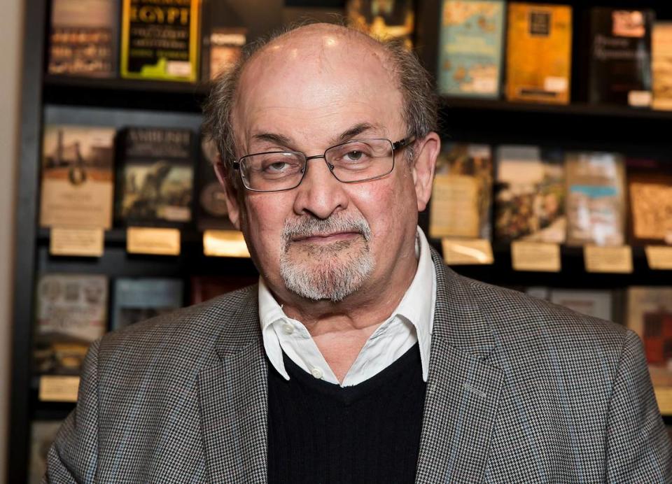 FILE - Author Salman Rushdie appears at a signing for his book “Home” in London on June 6, 2017. Rushdie has been attacked while giving a lecture in western New York. An Associated Press reporter witnessed a man storm the stage Friday at the Chautauqua Institution and begin punching or stabbing Rushdie as he was being introduced. (Photo by Grant Pollard/Invision/AP, File)