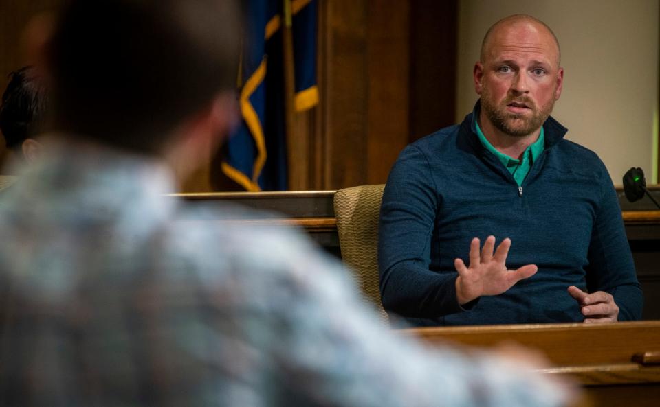 Monroe County Election Board Chair Donaven Garletts asks questions of David Wolfe Bender in regards to his candidacy for the City Council District 6 seat at the Monroe County Courthouse on Thursday, May 18, 2023.