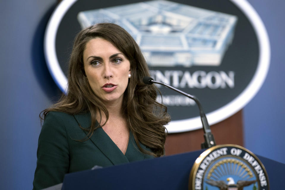 In this March 25, 2020 provided by the Department of Defense, Pentagon Press Secretary Alyssa Farah briefs the press on the department's COVID-19 response efforts, at the Pentagon in Washington. White House press secretary Stephanie Grisham is leaving her post nine months into the job after never holding a single press briefing. She will be replaced by two women who are familiar names in Trump world. Trump campaign spokeswoman Kayleigh McEnany will be joining the administration as press secretary, while Pentagon spokeswoman Alyssa Farah will be moving to the White House in a strategic communications role. (Lisa Ferdinando/Department of Defense via AP)