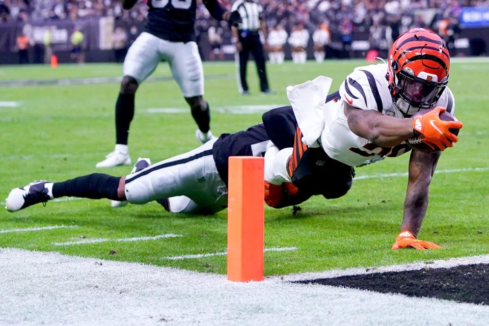 Cincinnati Bengals running back Joe Mixon (28) carries the ball on a touchdown run in the second quarter during a NFL Week 11 game, Sunday, Nov. 21, 2021, at Allegiant Stadium in Las Vegas.