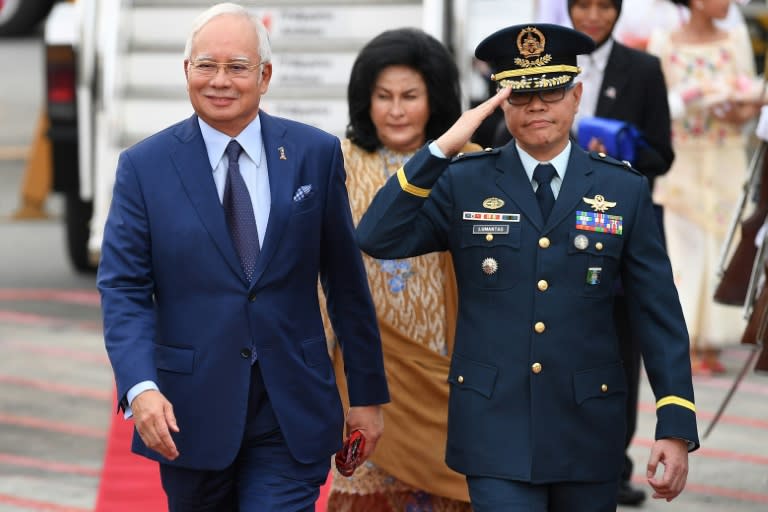 Malaysian Prime Minister Najib Razak (L) has long been accused of repressing dissent