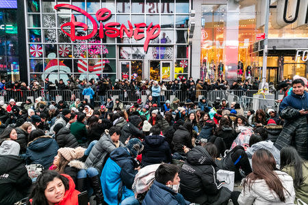 Revelers wait for the New Year's Eve in Times Square in the Manhattan borough of New York, U.S., December 31, 2018 REUTERS/Jeenah Moon