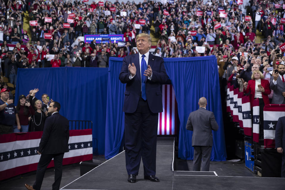 President Donald Trump arrives at UW-Milwaukee Panther Arena to speak at a campaign rally, Tuesday, Jan. 14, 2020, in Milwaukee. (AP Photo/ Evan Vucci)