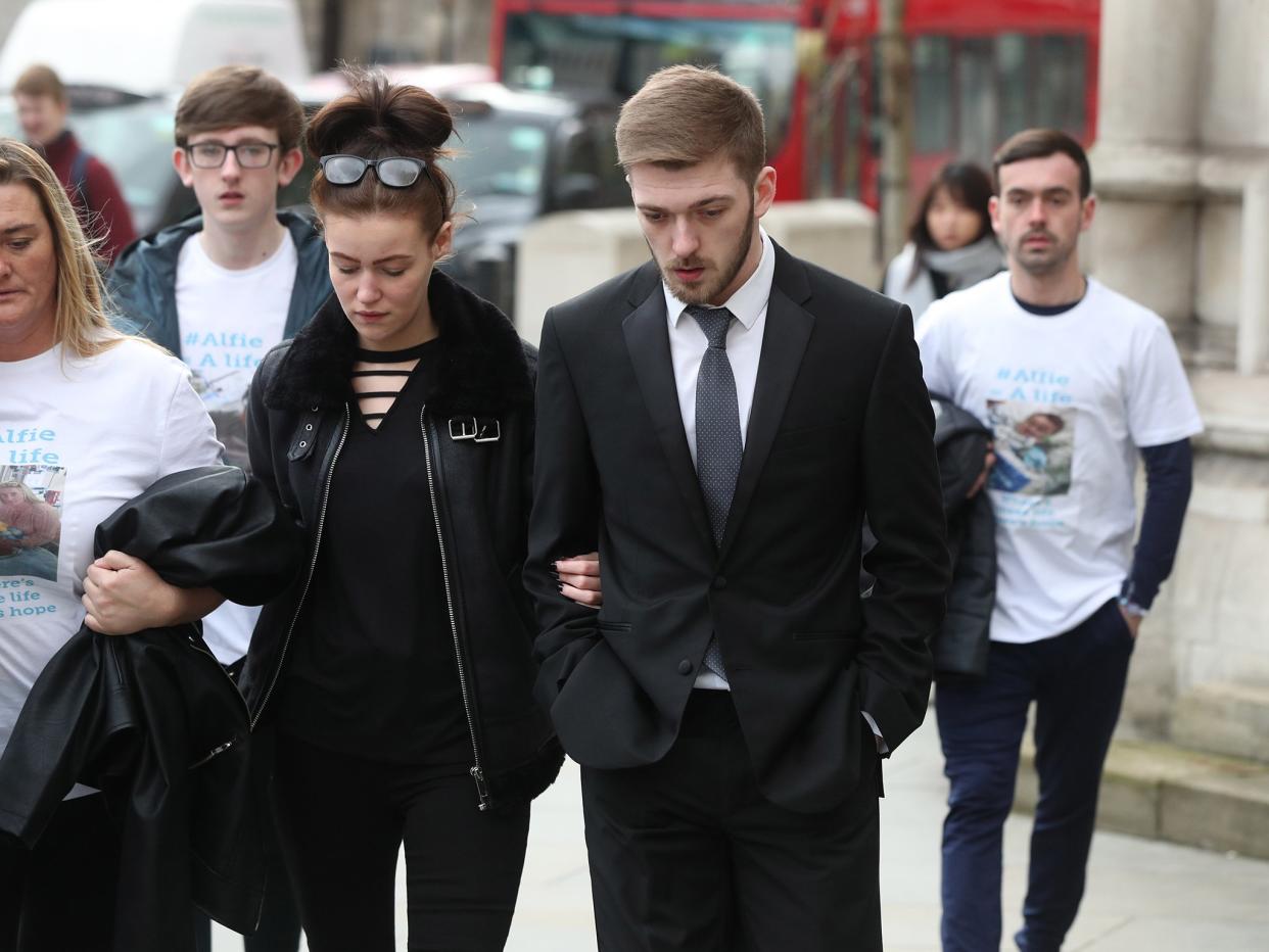 Tom Evans and Kate James the parents of 21-month-old Alfie Evans arrive at the High Court in London: PA